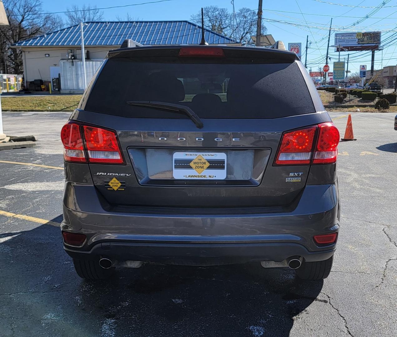 2016 Gray /Black Dodge Journey SXT (3C4PDCBGXGT) with an 3.6L V6 DOHC 24V engine, Automatic, 6-Spd Auto Stick transmission, located at 341 N White Horse Pike, Lawnside, NJ, 08045, (856) 262-9500, 39.855621, -75.027451 - Photo#5